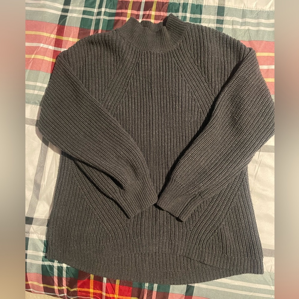 Mockneck cable knit sweater